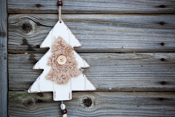 vintage wooden christmas decoration hanging - rustic holiday background