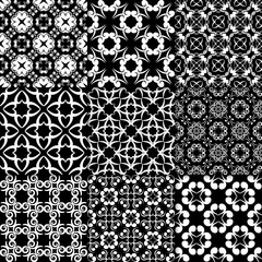 Black and white floral ornaments. Collection of seamless patterns