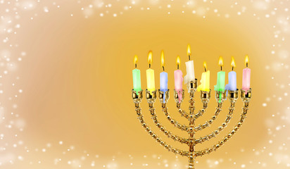 Menorah with candles on golden background with space for text. Jewish holiday Hanukkah.