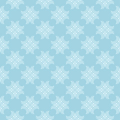 White floral seamless pattern on blue background