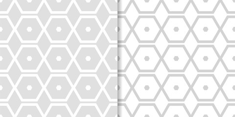 Set of geometric ornaments. Light gray seamless patterns