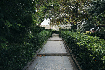 Stone road through the park to the fortress.