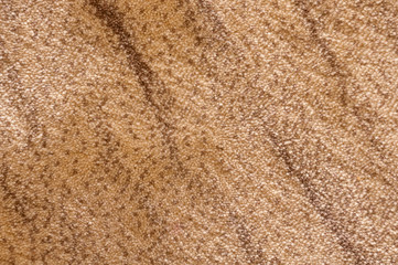 Texture light beige soft dense fabric with abstract brown chaotic stripes