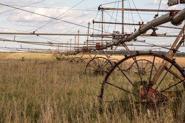rusty old irrigation system of fields