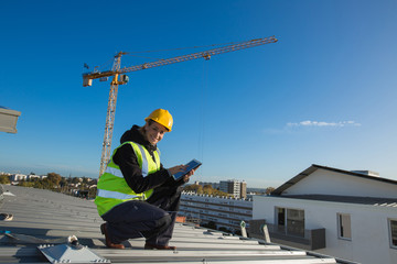 Woman engineer with safety hat is working at site
