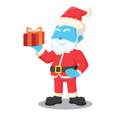 Blue santa claus holding a gift– stock illustration
