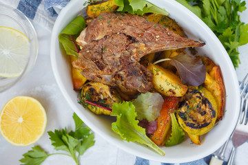 Grilled lamb with baked vegetables