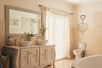 Fototapeta na wymiar Stylish bathroom interior in a modern suburban home