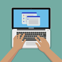 Flat Hands typing on white keyboard with laptop computer and website on screen