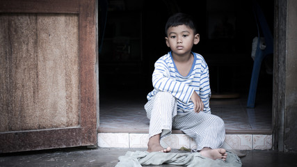 poor asian boy  sad alone ,vintage tone