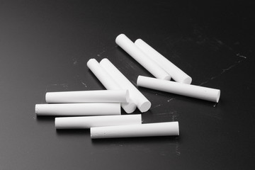White chalk isolated on a Black background