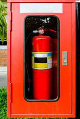 Fire extinguisher,Fire Extinguisher in red cabinet at exterior buildings.