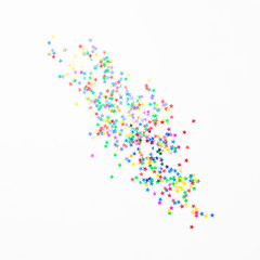 Bright colorful confetti on white background. Party concept. Flat lay, top view