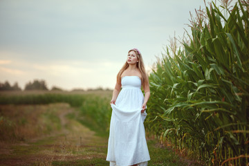 Woman is walking around the village.