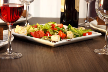 luxury dinner served on the table with glass of wine