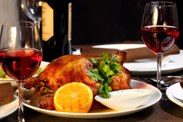 luxury dinner served on the table with glasses of red wine