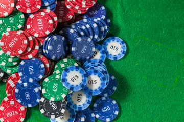 casino chips border background on green table