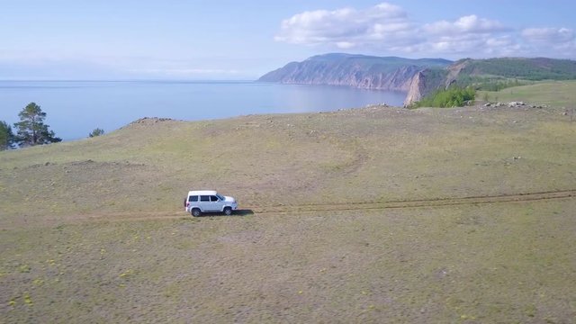 ProRes. Car rides along the shore of the lake Baikal. Landscape.