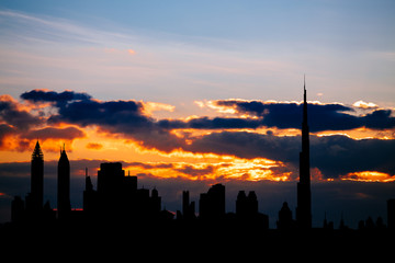 Fototapeta na wymiar Dubai cityscape silhouette on sunset