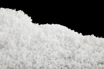 snow on a black background close-up