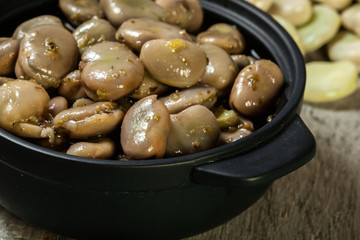 Broad beans stewed with onion and oregano