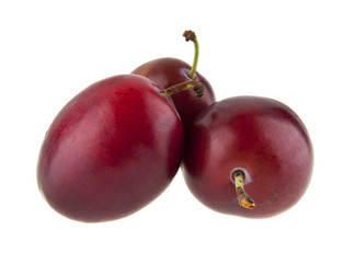 plums isolated on white background