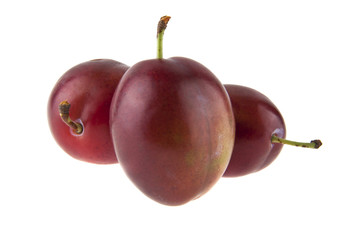 plums isolated on white background