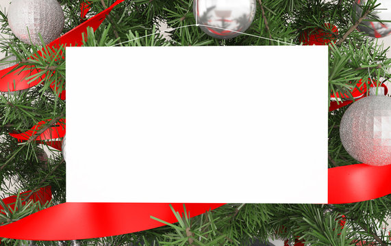 white card hanging on christmas tree