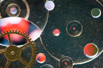 Detail of watch machinery on the table.