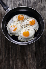 delicious fresh fried eggs in skillet