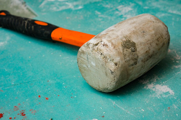 rubber mallet on drywall
