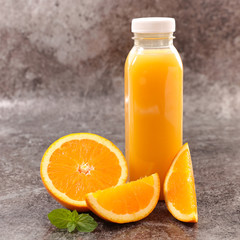 Obraz na płótnie Canvas bottle of orange juice