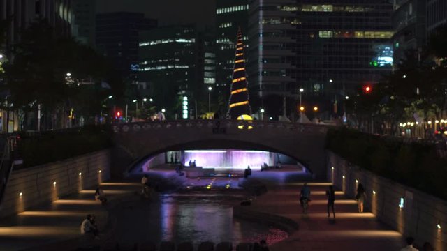 SEOUL, SOUTH KOREA &ndash; JULY 216 : Video shot of Cheonggyecheon / Seoul Canal at night with stream and people in view