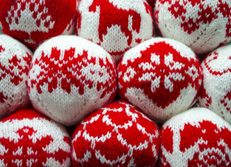 Knitted balls with ornament for new year and christmas decoration