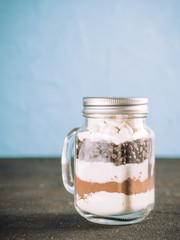Hot chocolate mix in mason jar with copy space