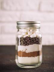 Hot chocolate mix in mason jar with copy space