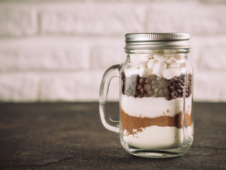 Hot chocolate mix in mason jar with copy space