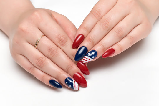 Red blue nails with a design American flag on long sharp nails
