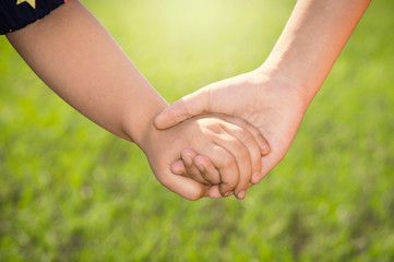 kids join hands