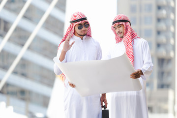 Arab business man looking working on plan peper in the city