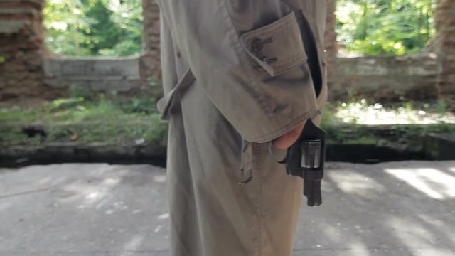 Aim at someone in retro style. Tracking shot. FULL HD