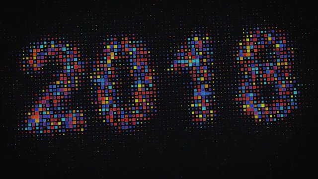 Colorful pixelated text 2017 switches to 2018 on digital monitor. Happy new year concept. Computer generated animation 4k UHD (3840x2160)
