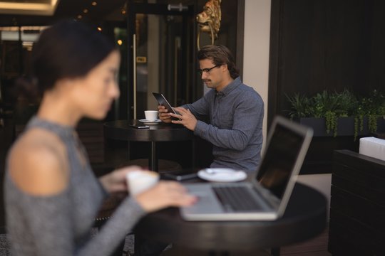 Man using digital tablet