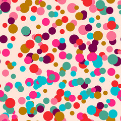 Colorful messy dots on beige background. Festive seamless pattern with round shapes. Grunge dotted texture for wrapping paper, web. Vector illustration.
