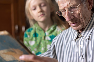 senior man  and the great-granddaughter