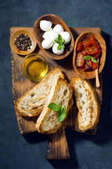 antipasti on a cutting board, top view