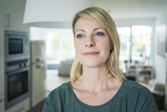 Portrait Of Confident Woman At Home