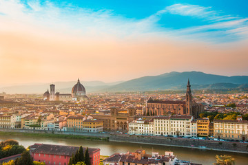Obraz premium A fabulous panoramic view of Florence from Michelangelo Square at sunset. It is a pilgrimage of tourists and romantics. Duomo Cathedral. Italy, Tuscany
