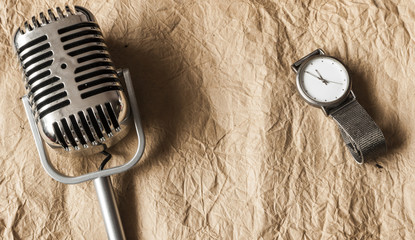 Retro microphone. Vintage style or worn paper photo image