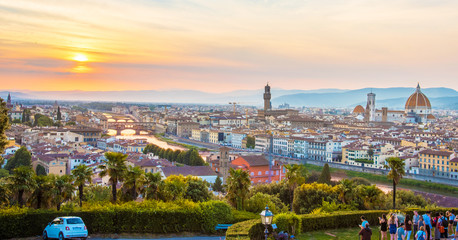 Obraz premium A fabulous panoramic view of Florence from Michelangelo Square at sunset. It is a pilgrimage of tourists and romantics. Duomo Cathedral. Italy, Tuscany